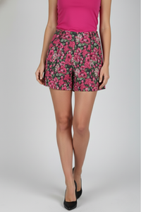 Short Del Rosario en drill estampado floral fucsia y verde con silueta amplia y bolsillos delanteros, vista frontal | Claudia Bertolero