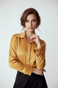Blusa Resplandor de seda dorada con mangas amplias y botones brillantes | Claudia Bertolero