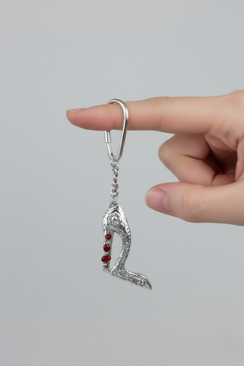 Llavero amancaes de plata 950 con semillas de huayruro y diseño artesanal peruano | Claudia Bertolero
