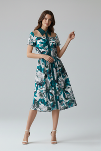 Vestido Pizarro de seda estampada verde con falda midi fluida y cintura elástica | Claudia Bertolero